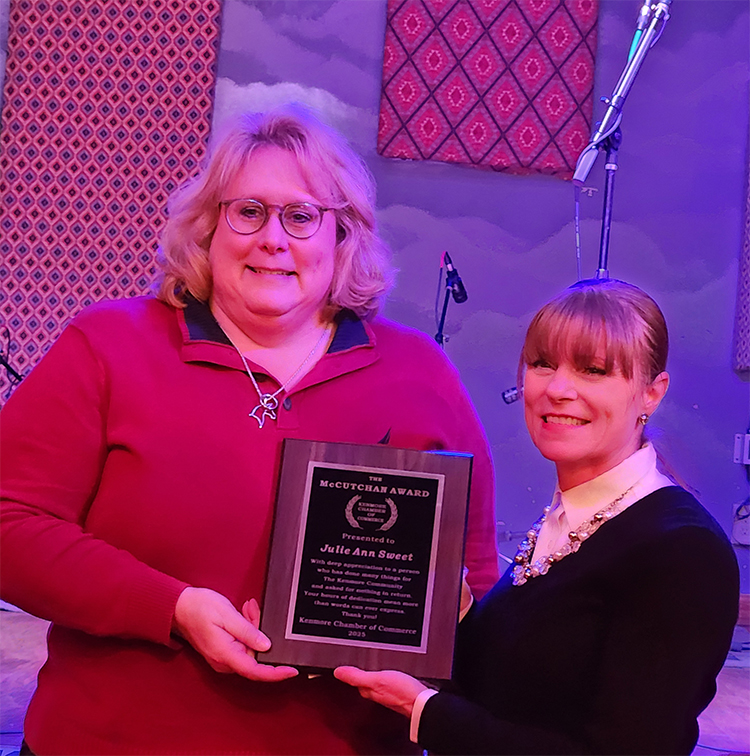 Julie Ann Sweet receiving award